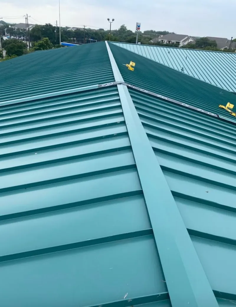 Green commercial metal roof ridge and valley for Metal Roof Repair in North Mankato