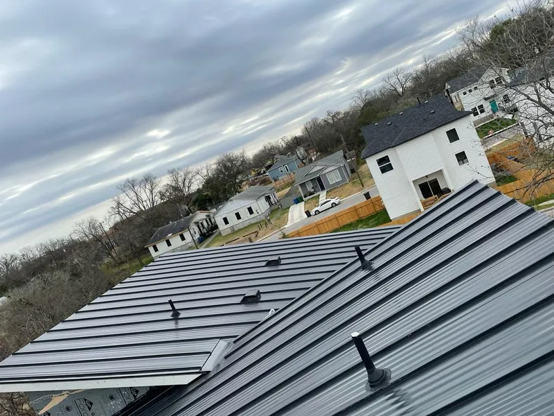 Standing seam metal roof panels with vents for Skylight Repair in North Mankato
